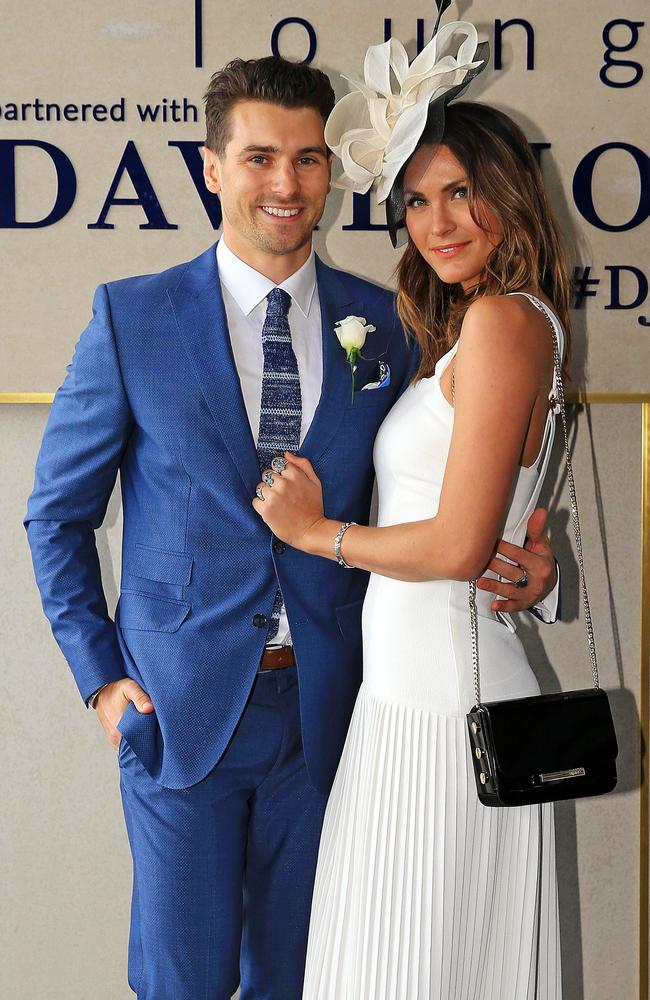 <i>The Bachelor </i>couple Matty J and Laura Byrne appear together at Caulfield Cup Day. Picture: Mark Stewart