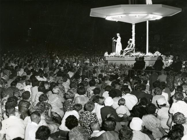 Queen Elizabeth II addresses thousands of people in a crowded Elder Park at the Royal Music Festival on February 20, 1963.