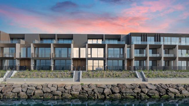 Two bidders contested the three-storey townhouse overlooking the water.