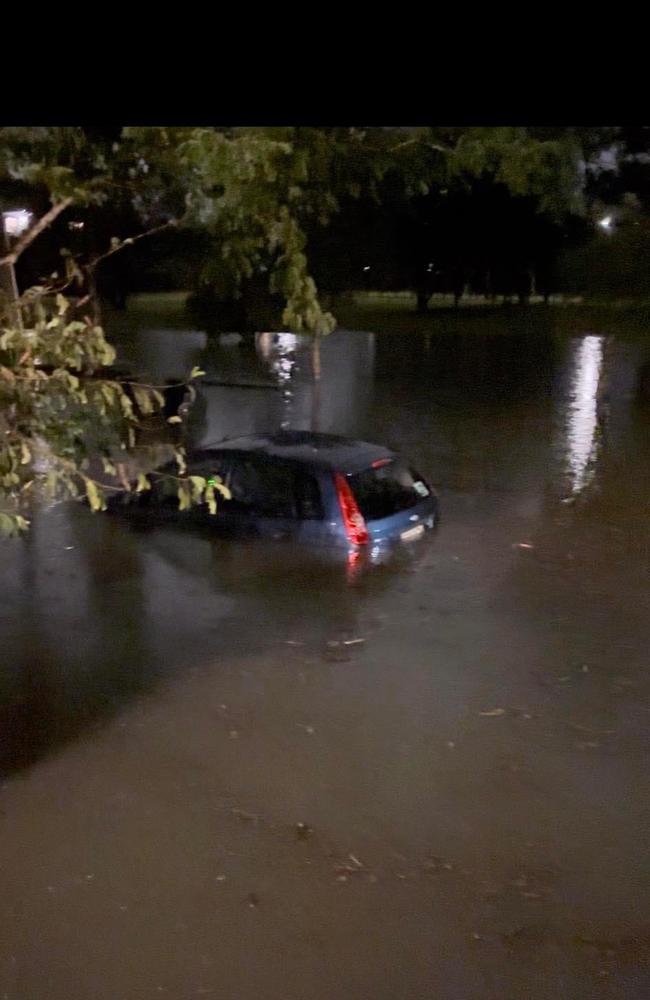 A car washed into the creek during a storm overnight on November 13, 2024. Image: Facebook/Rocklea 4061