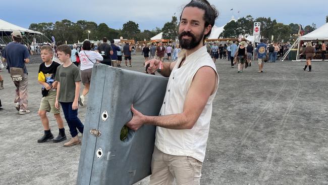 Anandan McEwed with massage table at Bluesfest 2023. Picture: Savannah Pocock
