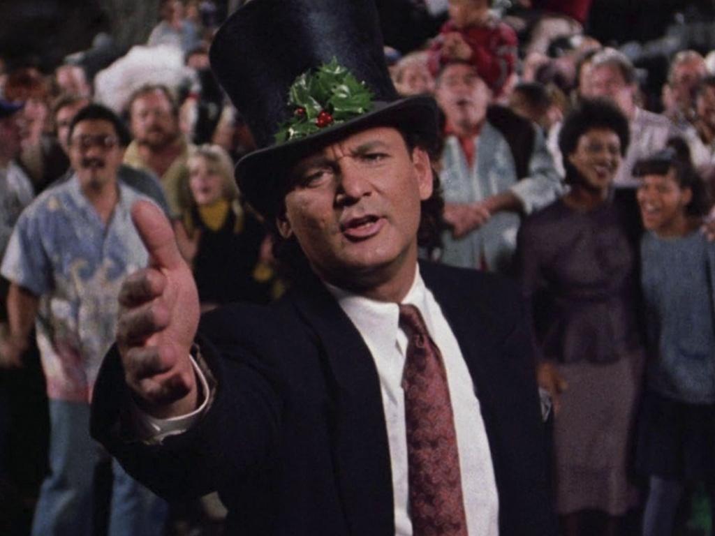 13. Scrooged (1988)<br/>Bill Murray’s cynical TV executive gets a supernatural wake-up call in this darkly comedic take on “A Christmas Carol.” With its sharp wit and satirical humour, “Scrooged” is a super fun holiday flick that delivers a message of redemption and compassion.