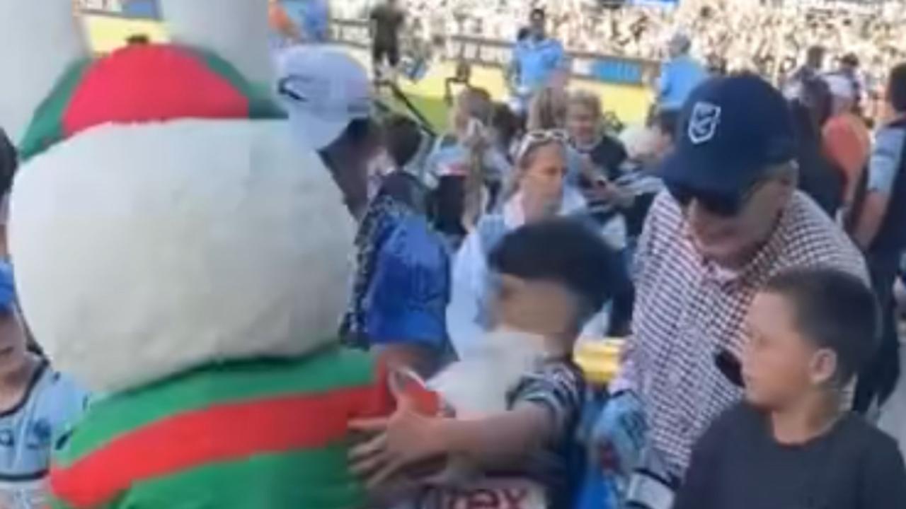 Watch: 81-year-old Rabbitohs mascot pushes young Sharks fan