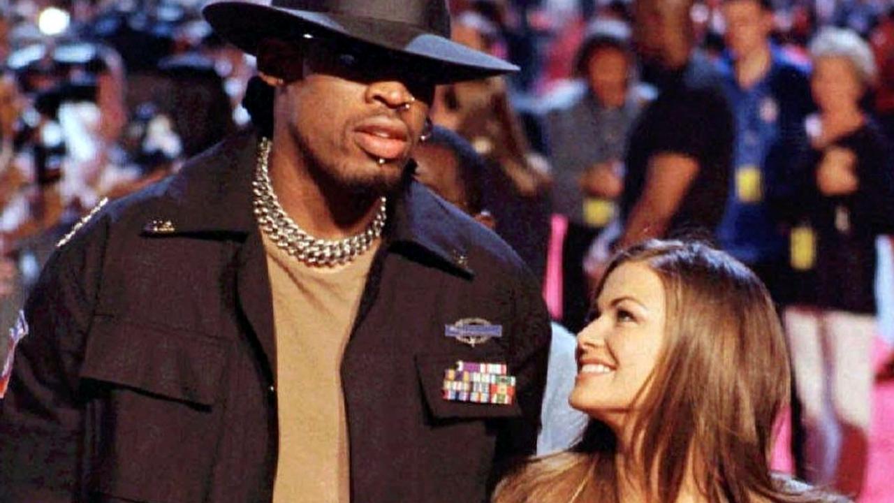 Dennis Rodman with Carmen Electra in 1998.