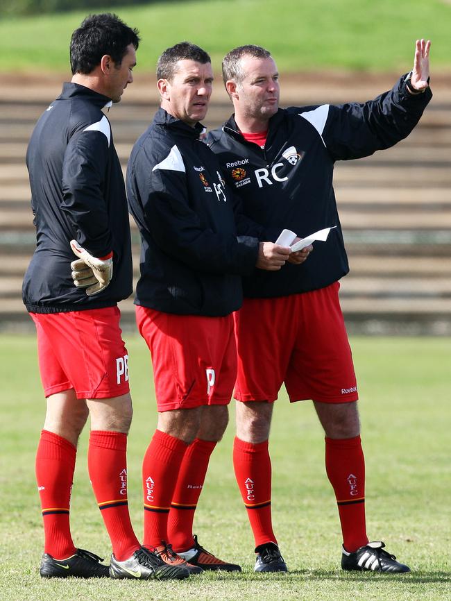 Phil Stubbins, flanked by ex-Adelaide United coach Rini Coolen and goalkeeper mentor Peter Blazincic, in 2010.