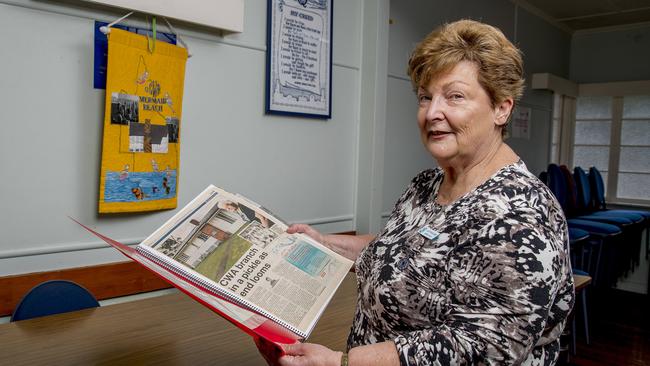CWA Mermaid Beach President Jan Woolmer showing off former Bulletin newspaper clippings about the club. Picture: Jerad Williams