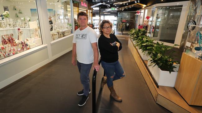 Concrete Lines and My Scooter Lab owner Les Graue with Saltwater Silver owner Sarah Roth in an empty mall at The Strand. Picture: Glenn Hampson.