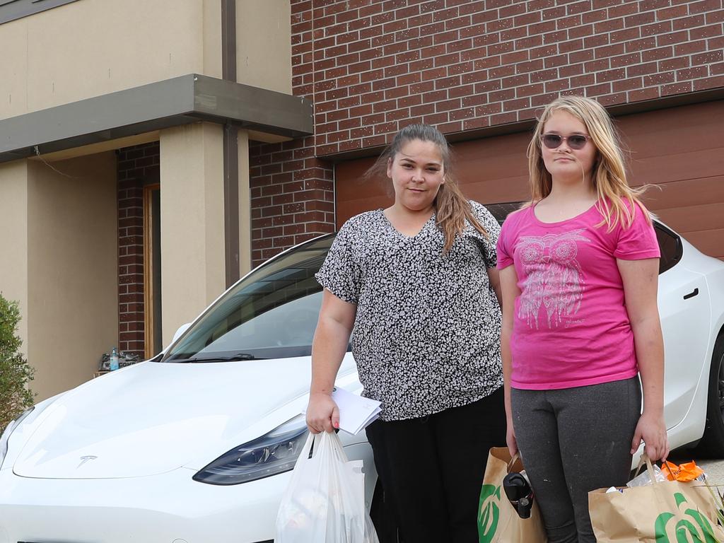 Rebecca Koeleman thought buying an electric car would help her save on money but was surprised to be hit with an electric car levy. She is pictured here with her daughter Rachel, 12. Picture: David Crosling