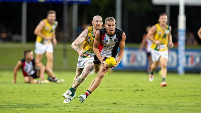 Jed Anderson on the run in during Southern Districts 2024-25 NTFL grand final win against St Mary's. PIcture: Pema Tamang Pakhrin