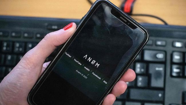 The ANoM app appears on the screen of a smartphone in Paris, on June 8, 2021. - Some 250 people were arrested in Sweden and Finland in the global sting on organised crime, authorities said on June 8, 2021, using phones planted by the US FBI, law enforcement officers were able to read the messages of global underworld figures in around 100 countries as they plotted drug deals, arms transfers and gangland hits on the compromised ANOM devices. (Photo by Olivier MORIN / AFP)