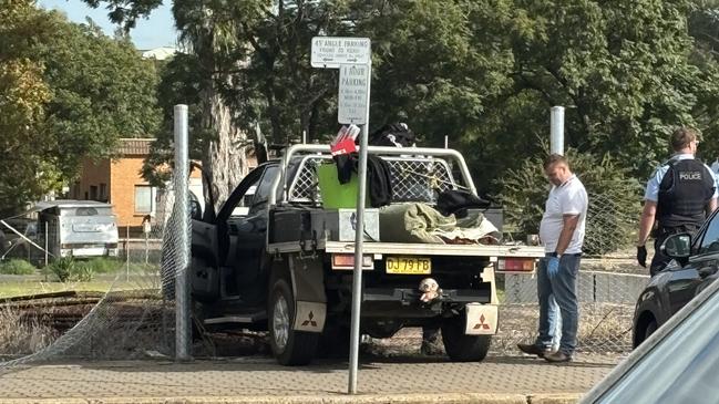 A ute crashed into a fence on Macquarie St, Dubbo. Photo: Tijana Birdjan