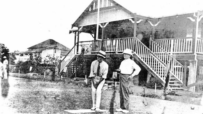 Harry Webster and Monsignor Joseph Mulcahy at City Bowls Club which was behind the old Mater hospital. Picture: Daily Mercury Archives