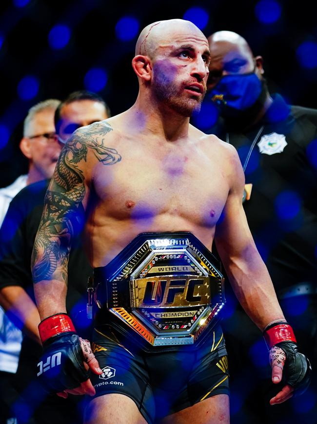 Alexander Volkanovski with his strap. Picture: Alex Bierens de Haan/Getty