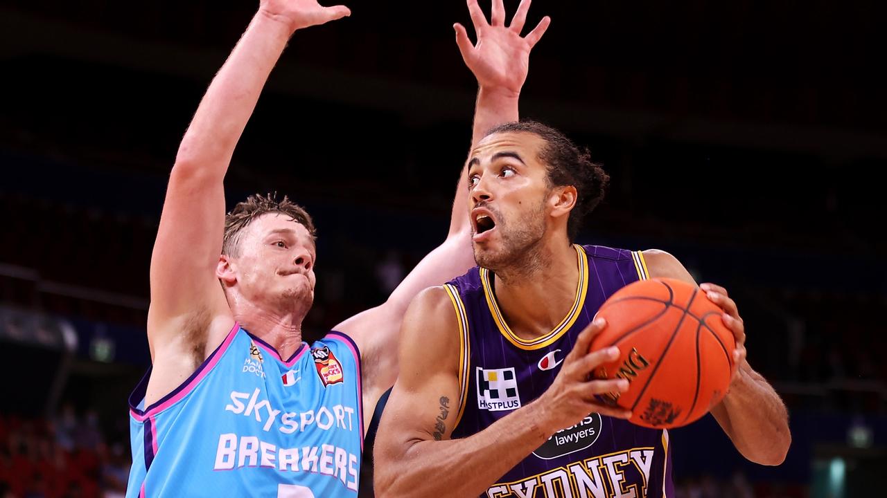 Xavier Cooks drives to the basket against New Zealand.