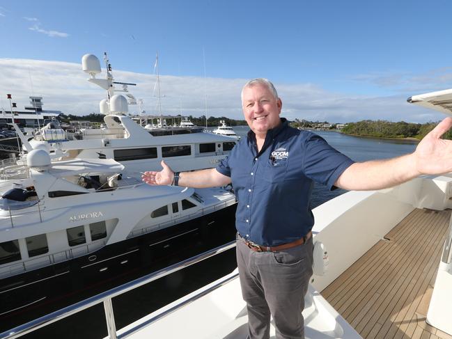 Gold Coast City Marina &amp; Shipyard CEO Trenton Gay among the superyachts. Picture: Richard Gosling