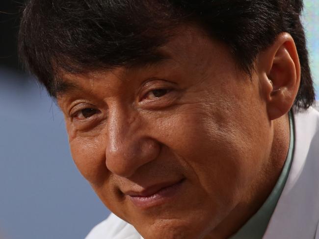 Hong Kong actor Jackie Chan takes part in the TV show "Le Grand Journal" on the set of French TV Canal+ during the 65th Cannes film festival on May 19, 2012 in Cannes. AFP PHOTO / LOIC VENANCE