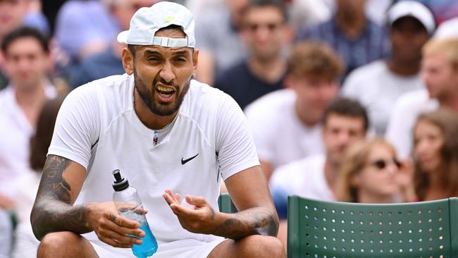 Nick Kyrgios reacts during his Wimbledon quarterfinal victory over Cristian Garin. Picture: AFP