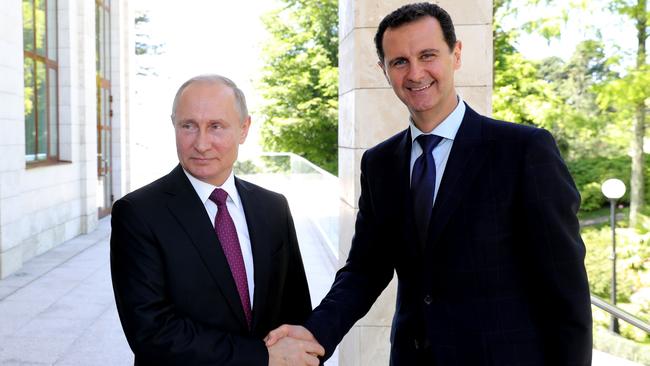 Russian President Vladimir Putin, left, with Syrian President Bashar al-Assad in May 2018. Picture: AFP/SPUTNIK/Mikhail Klimentyev