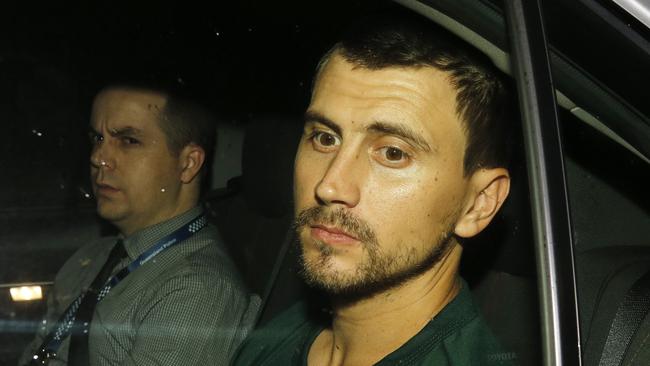 Christopher Puglia arriving at the Pine Rivers Watchhouse after being extradited from Sydney. Picture: AAP/Josh Woning