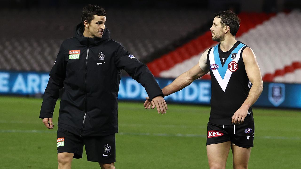 Scott Pendlebury post-match with milestone man Travis Boak. Picture: Michael Klein