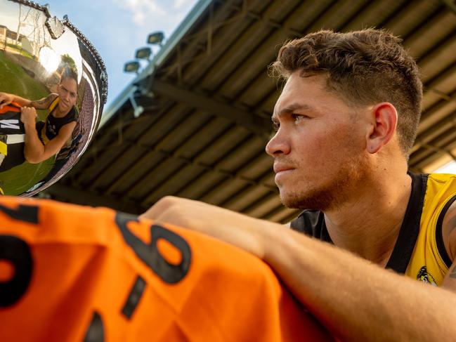 Nightcliff captain Phillip Wills – pictured with the NTFL Premiership Cup before his team’s 13-point win over St Mary’s in the 2019-20 grand final – believes his team is ready to defend its crown for a third-straight season. Picture: CHE CHORLEY