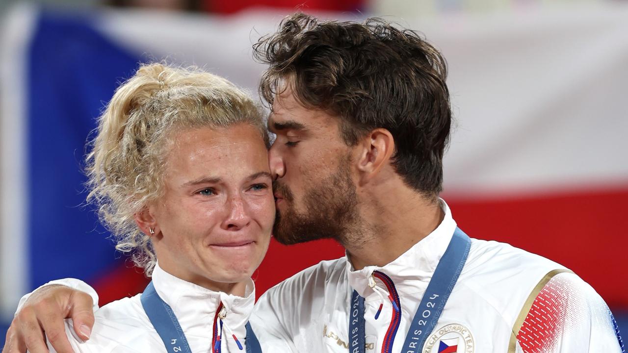 Gold medalists Katerina Siniakova and Tomas Machac of Team Czechia pose for a photo on the podium during the Tennis Mixed Doubles medal ceremony on day seven of the Olympic Games Paris 2024 at Roland Garros on August 02, 2024 in Paris, France. (Photo by Clive Brunskill/Getty Images)