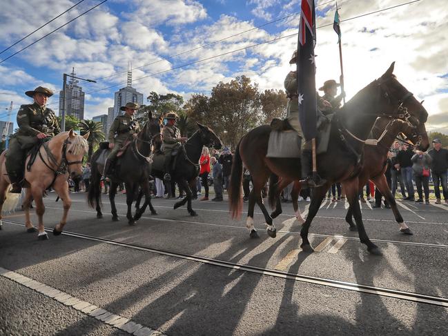 The sun bursts through during this morning’s march. Picture: Alex Coppel