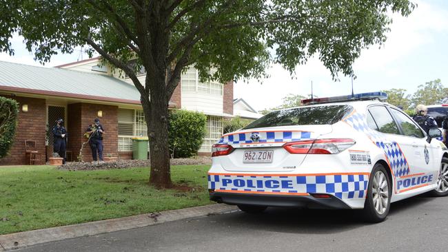 Police at a Toowoomba home where Elizabeth Struhs was found dead.