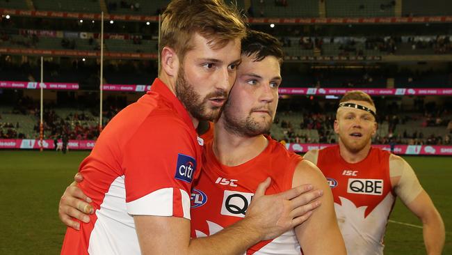 Alex Johnson with teammates Nic Newman after the game. Picture: Michael Klein