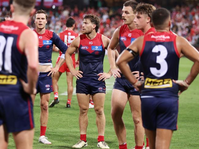 SYDNEY, AUSTRALIA - MARCH 07:  Jack Viney of the Demons and team mates look dejected after the Opening Round AFL match between Sydney Swans and Melbourne Demons at SCG, on March 07, 2024, in Sydney, Australia. (Photo by Matt King/AFL Photos/Getty Images)