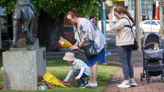 Community members have left flowers at the scene in the wake of the tragedy. Picture: NCA NewsWire / Brendan Beckett