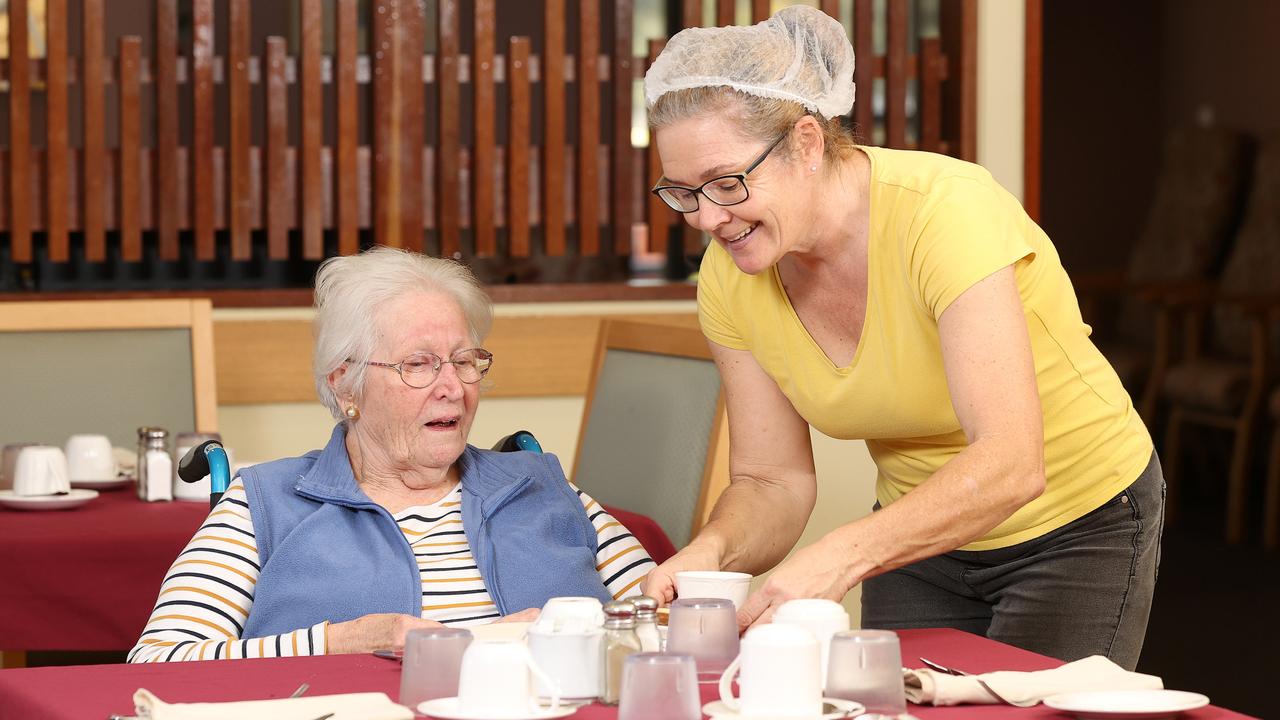 Resident Valerie Stacey, 82, and assistant in nursing Sarah Greeno at Wongaburra Garden Settlement. Picture: Tara Croser.