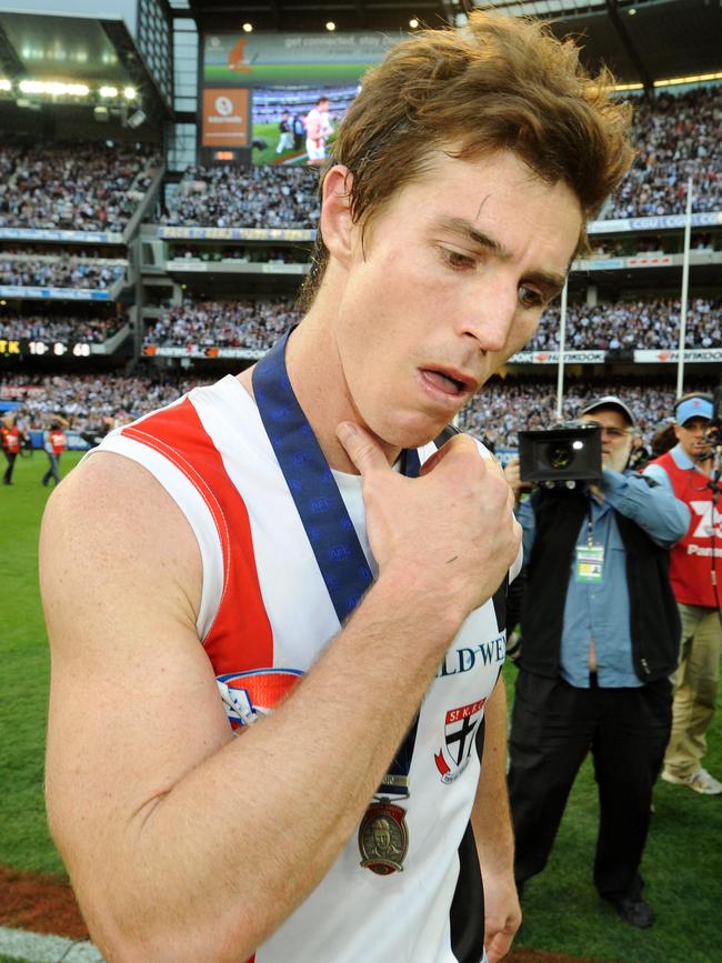 Lenny Hayes with the Norm Smith Medal.