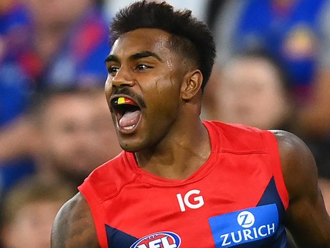 MELBOURNE, AUSTRALIA - MARCH 18: Kysaiah Pickett of the Demons celebrates kicking a goal during the round one AFL match between Melbourne Demons and Western Bulldogs at Melbourne Cricket Ground, on March 18, 2023, in Melbourne, Australia. (Photo by Quinn Rooney/Getty Images)