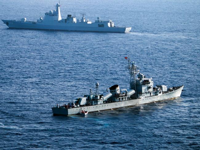 (FILES) This file photo taken on May 5, 2016 shows crew members of China's South Sea Fleet taking part in a drill in the Xisha Islands, or the Paracel Islands in the South China Sea. China and Russia will hold joint naval exercises in the South China Sea in September, Beijing's defence ministry said on July 28, 2016, after an international tribunal invalidated the Asian giant's extensive claims in the area. / AFP PHOTO / STR