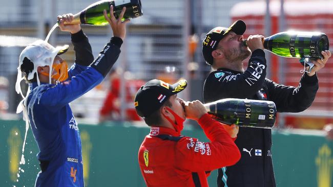 Race winner Valtteri Bottas, second placed Charles Leclerc and third placed Lando Norris celebrate on the podium at Austria’s Red Bull Ring.