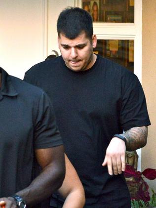 Rob Kardashian cuts a much slimmer frame as he takes his