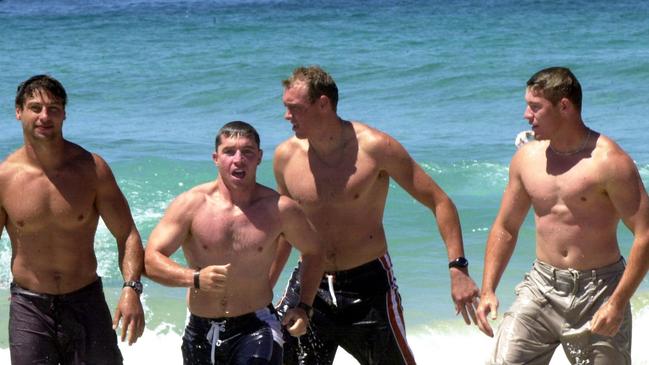 JANUARY 11, 2001 : Sydney Roosters NRL players (L-R) Luke Ricketson, Paul Green, Craig Fitzgibbon and Trent Clayton at Bondi Beach 11/01/00. Pic Kristi Miller.