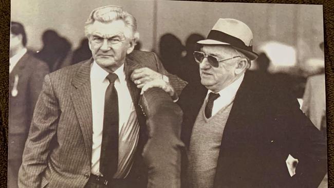 Former Australian Prime Minister Bob Hawke (left) with Ray Guy. The note from Bob says "To Ray, a good guy and a good friend. Best wishes, from Bob Hawke. Picture: Supplied.