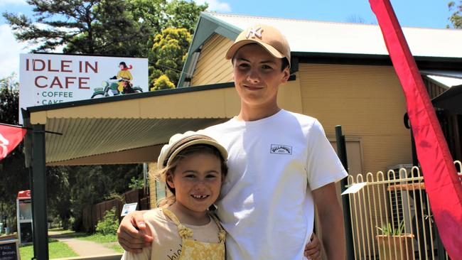 Nganggulaawan Wright and Jackson Taylor outside the Idle In Cafe in Nana Glen. The pair were out with their mother Chelsea on the Shop the Orara Valley weekend. Photo: Tim Jarrett