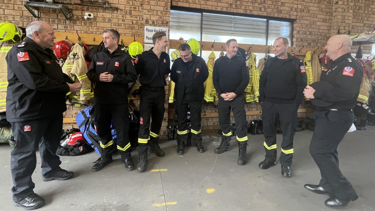 NSW Fire and Rescue Commissioner Paul Baxter with firefighters Cheyne Jobson, Matthew Springall, Matthew Casey, Stephen Francis, Philip Vaiciurgis and Michael Morris at Wentworthville fire station.