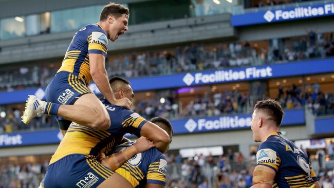 Mitchell Moses celebrating Oregon Kaufusi's try. Picture: Jonathan Ng