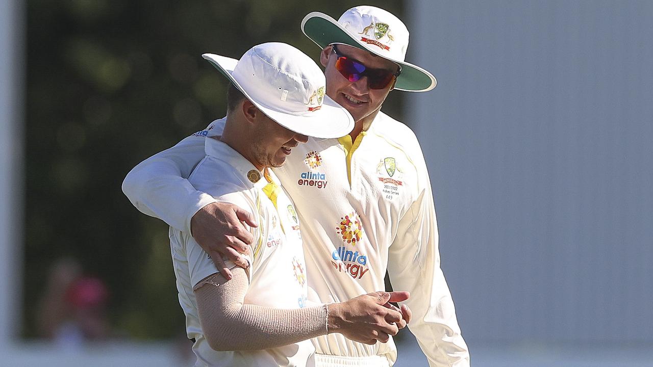 BRISBANE, AUSTRALIA - DECEMBER 12: Australia A's Mitch Swepson and Matt renshaw leave the field after the win during the Tour Match between Australia A and England Lions at Ian Healy Oval, on December 12, 2021, in Brisbane, Australia. (Photo by Peter Wallis/Getty Images)