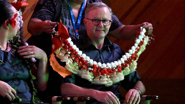 Anthony Albanese receives a garland at the Pacific Islands Forum in Suva in 2022. Picture: AFP