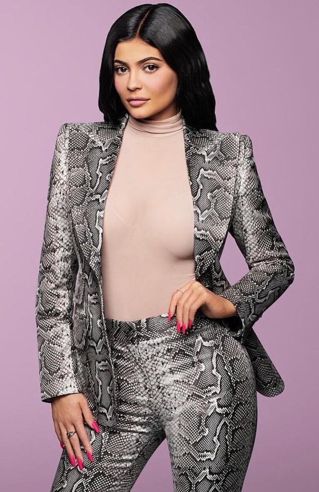 Kylie Jenner has been named the youngest billionaire ever at the age of 21, but judging from her reaction she's not bothered by the accolade. Picture: Forbes