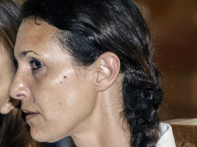 Australian woman Sara Connor listens to the translator during her second trial at Denpasar Court, Bali, Indonesia, Wednesday, Nov. 16, 2016. Connor and her British boyfriend David Taylor are facing charges of murder, fatal assault in company and assault causing death over the alleged killing of Bali police officer Wayan Sudarsa, whose body was found on Kuta Beach in the early hours on August 17. (AAP Image/Johannes Christo) NO ARCHIVING