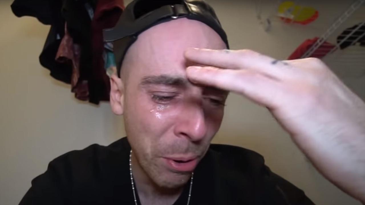 A tearful JayStation cries in a video where he admits to faking his girlfriend's death