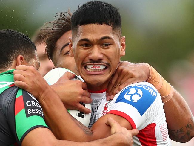 Junior Amone of the Dragons has been charged over an alleged attack on a man at an Illawarra home.