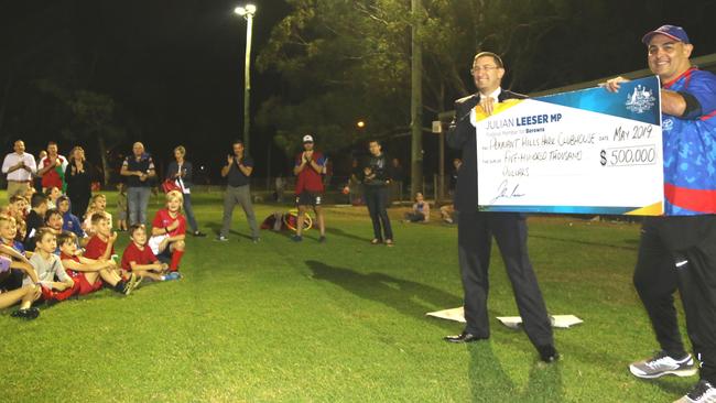 Federal liberal member for Berowra Julian Leeser has announced a further $500,000 in funding to secure the upgrade to the clubhouse at Ern Holmes Oval, Pennant Hills. Mr Leeser handing a cheque to Pennant Hills Demons president Steve Protogeros.