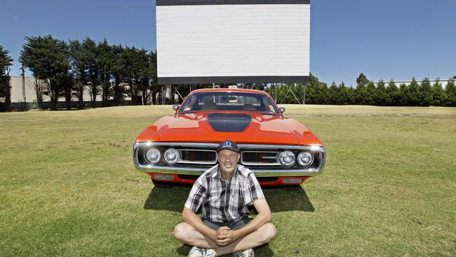 Dandenong open air cinema, Lunar Drive-In is hosting its 10th classic car show on February 1, with classic vehicles on display and Back to the Future playing. Owner David Kilderry with a red classic car.